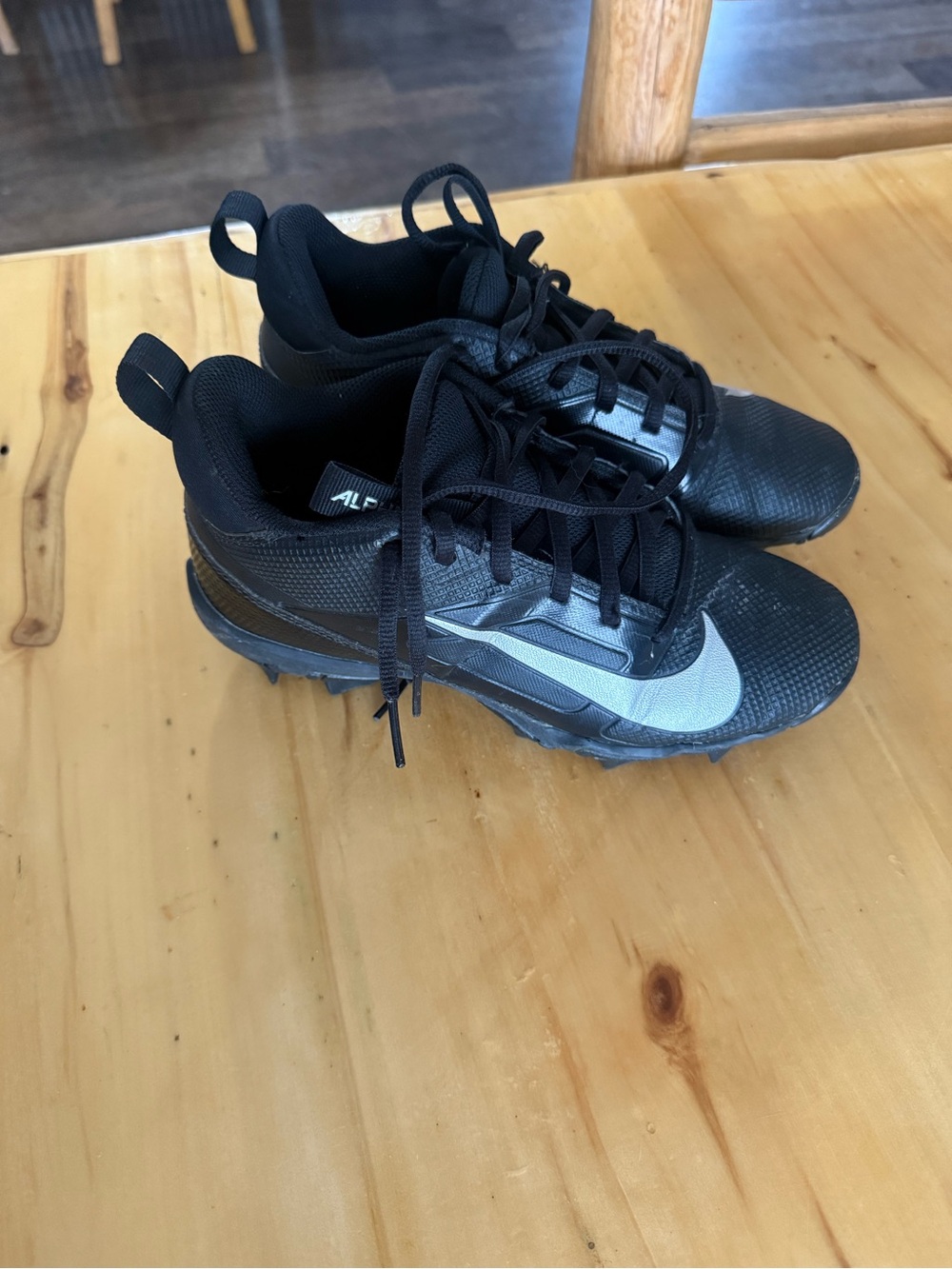 Youth Nike Alpha Black football cleats size 4.5